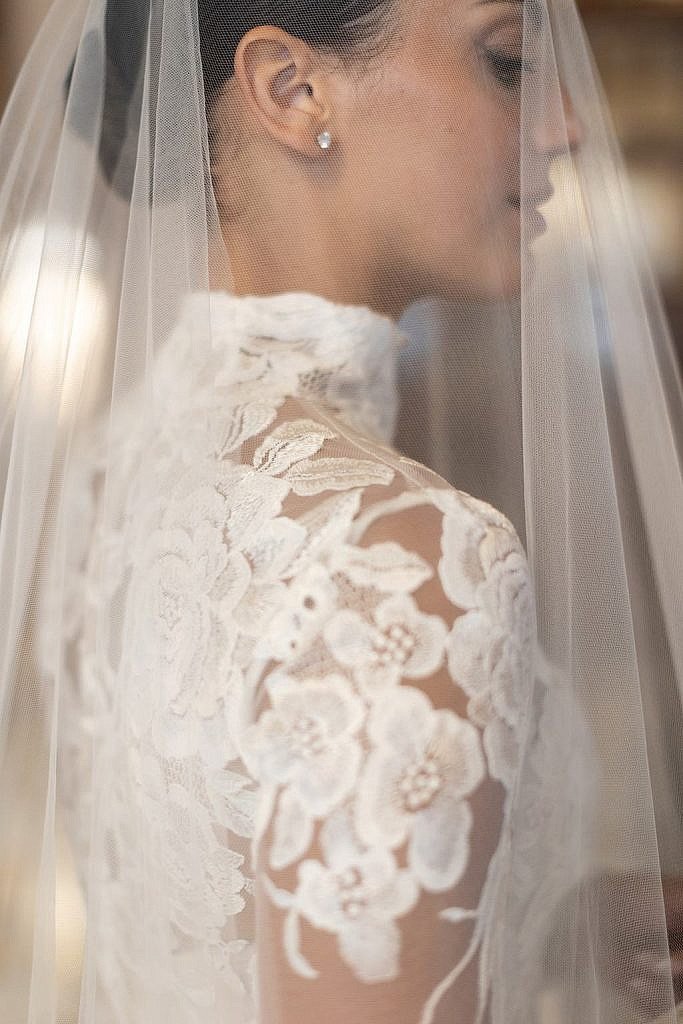 editorial bridal portrait under her eisen stein bridal wedding veil in Florence