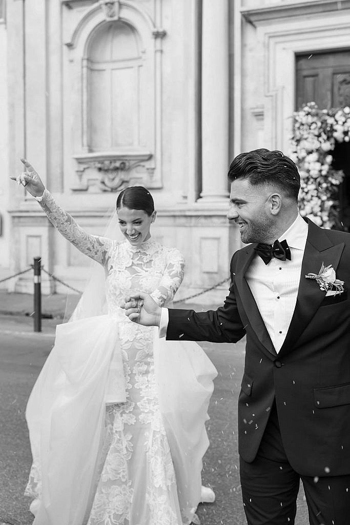 newlyweds just getting out of chiesa di ognissanti in florence